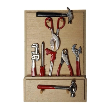 Tools on a wooden panel